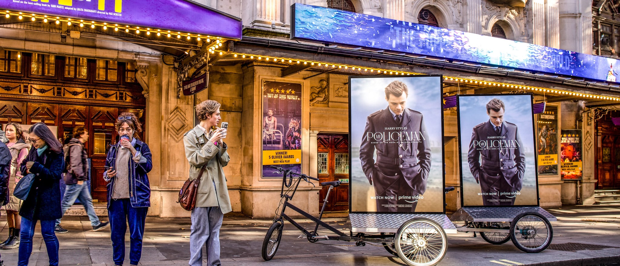 People standing outside the theatre